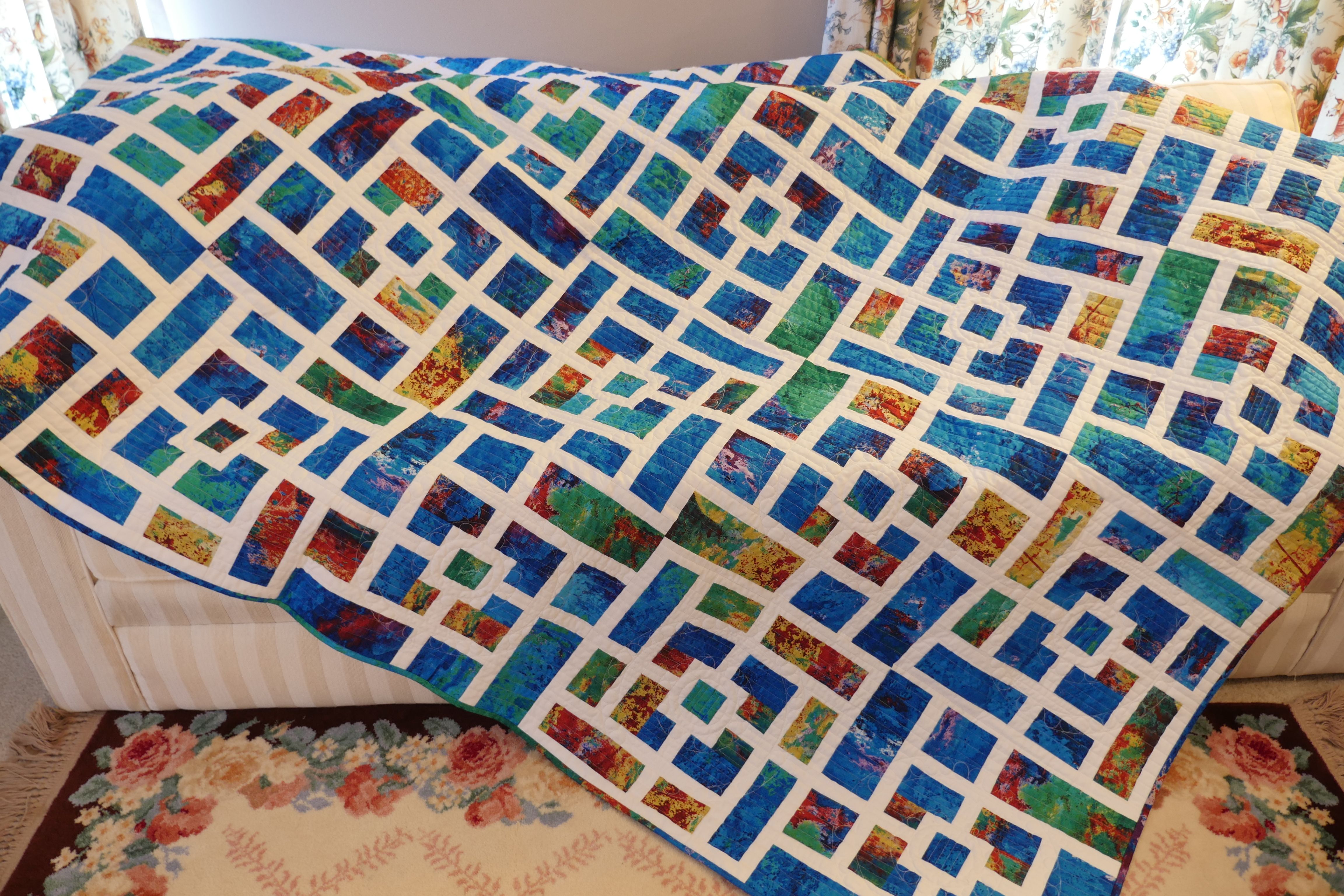 Two Quilts, Same Pattern--but VERY Different Fabrics!