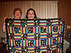 deb-victoria-holding-quilt.jpg