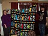 clayton-deb-holding-quilt.jpg